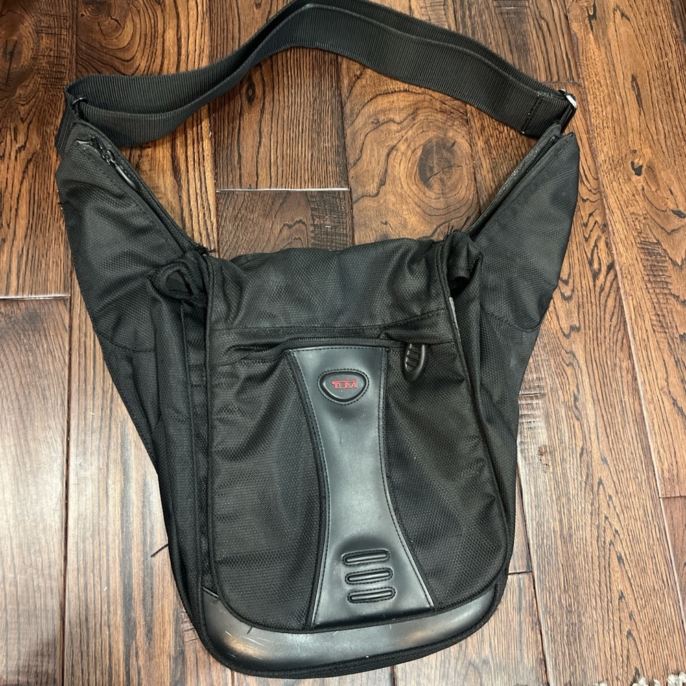 Tumi Black Messenger Bag Durable and Functional